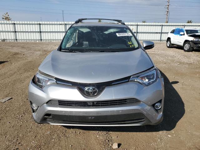 Photo 5 from auction – 2018 TOYOTA RAV4 LIMIT with VIN JTMDFREV3JJ191790