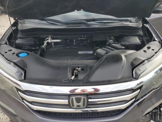 Photo 12 from auction – 2016 HONDA PILOT TOUR with VIN 5FNYF6H94GB024093