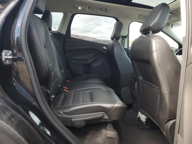 Photo 11 from auction – 2018 FORD ESCAPE TITANIUM with VIN 1FMCU9J94JUA60260