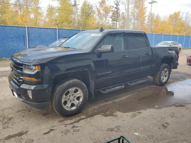 CHEVROLET SILVERADO 2018 with VIN 3GCUKREC4JG419405 - Photo from auction