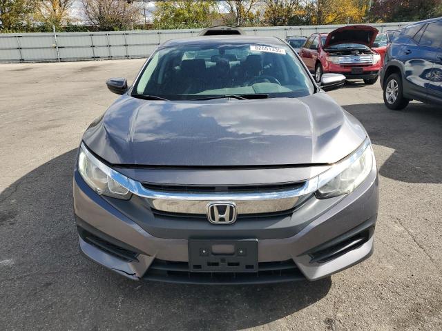 Photo 5 from auction – 2016 HONDA CIVIC LX with VIN 19XFC2F59GE004128