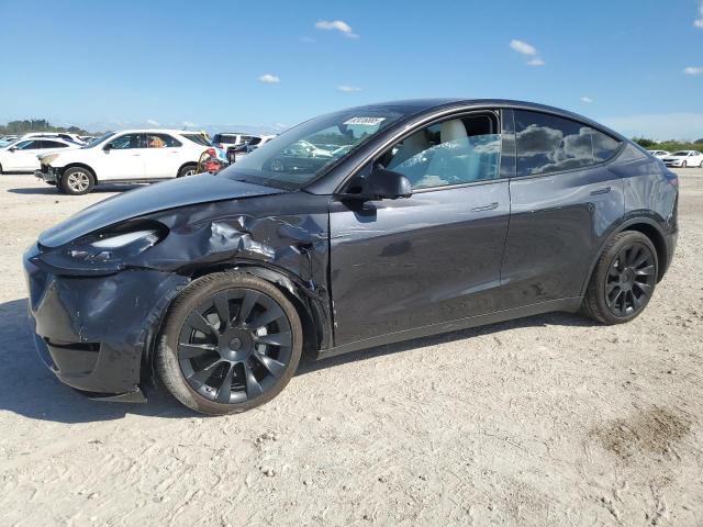 TESLA MODEL Y 2024 with VIN 7SAYGDED1RF047167 - Photo from auction