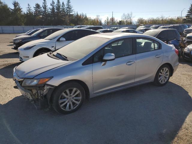 HONDA CIVIC LX 2012 with VIN 2HGFB2F53CH039587 - Photo from auction
