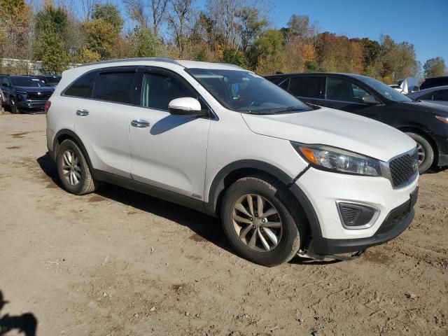 Photo 4 from auction – 2016 KIA SORENTO LX with VIN 5XYPGDA39GG057490