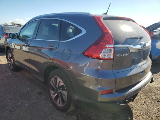 Photo 2 from auction – 2016 HONDA CR-V TOURI with VIN 5J6RM4H97GL085489