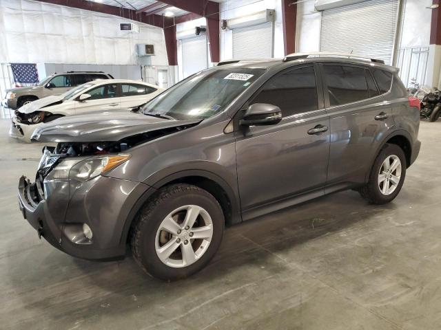 TOYOTA RAV4 XLE 2014 with VIN JTMRFREV5ED087201 - Photo from auction