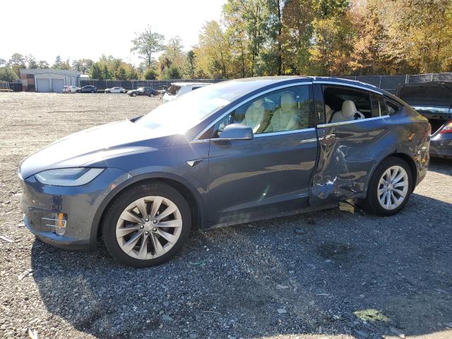 TESLA MODEL X 2020 with VIN 5YJXCAE22LF243532 - Photo from auction