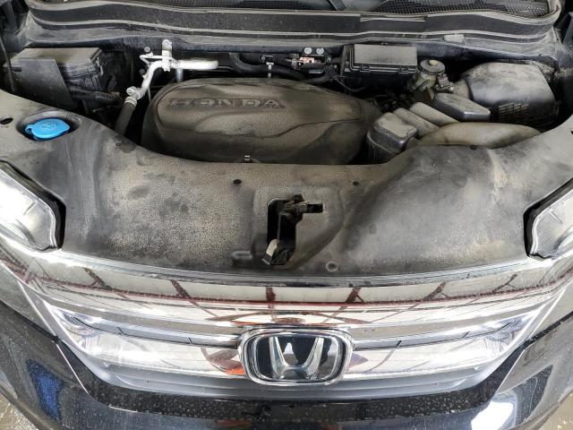 Photo 12 from auction – 2021 HONDA PILOT EXL with VIN 5FNYF6H58MB059728