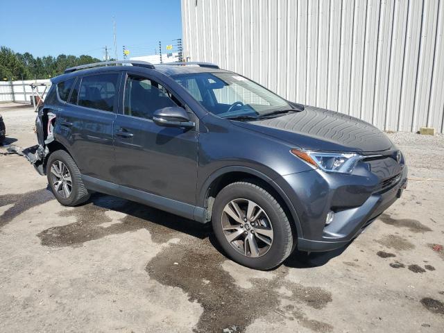 Photo 4 from auction – 2017 TOYOTA RAV4 XLE with VIN JTMRFREV0HJ715705