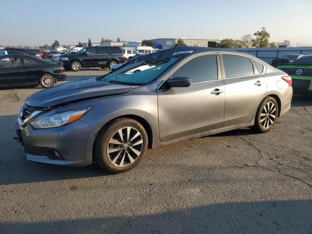 NISSAN ALTIMA 2017 with VIN 1N4AL3AP1HC271674 - Photo from auction