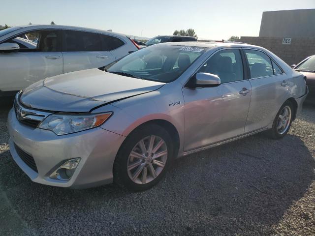 TOYOTA CAMRY HYBR 2012 with VIN 4T1BD1FK2CU018214 - Photo from auction