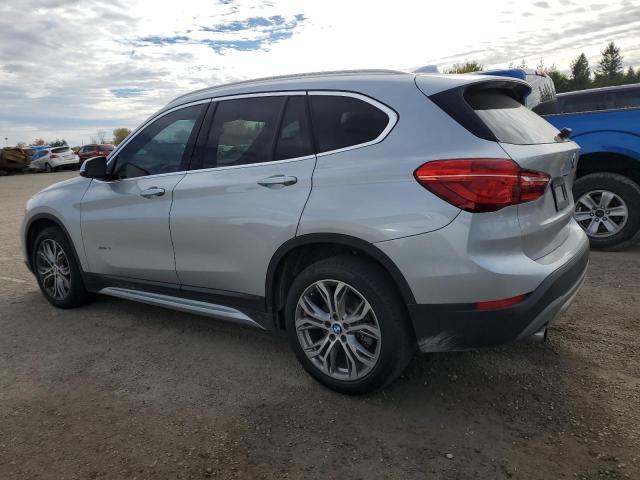 Photo 2 from auction – 2017 BMW X1 XDRIVE2 with VIN WBXHT3C30H5F73017