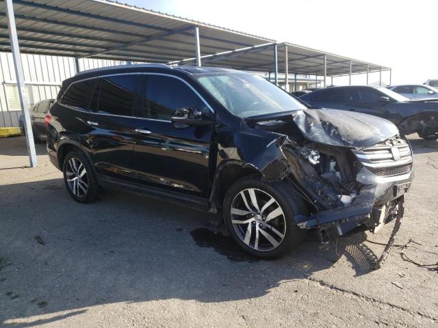 Photo 4 from auction – 2016 HONDA PILOT TOURING with VIN 5FNYF6H92GB110843