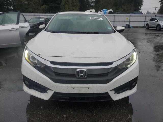 Photo 5 from auction – 2016 HONDA CIVIC LX with VIN 19XFC2F58GE020224