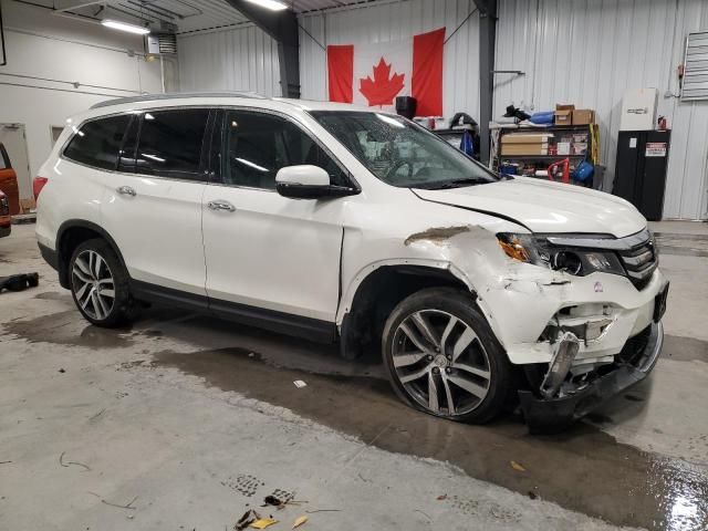 Photo 4 from auction – 2018 HONDA PILOT TOUR with VIN 5FNYF6H90JB502503