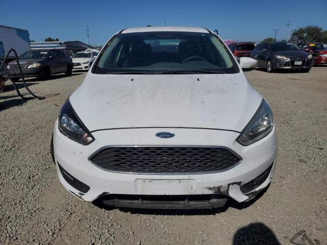 Photo 5 from auction – 2016 FORD FOCUS SE with VIN 1FADP3K29GL258450