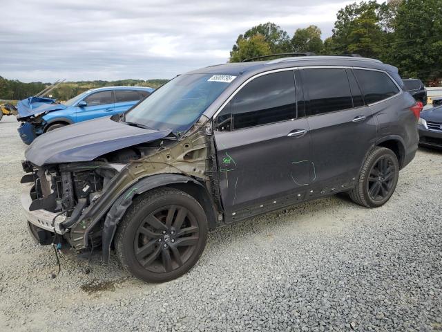 HONDA PILOT ELIT 2016 with VIN 5FNYF6H03GB035104 - Photo from auction