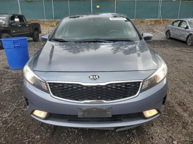 Photo 5 from auction – 2017 KIA FORTE LX with VIN 3KPFL4A79HE044604