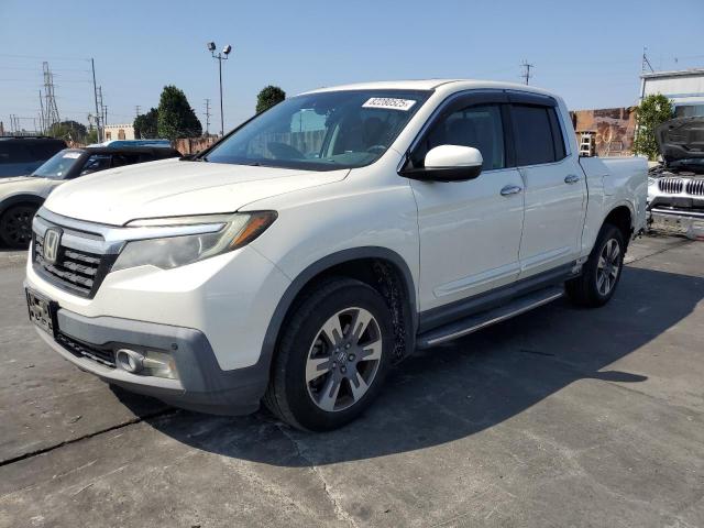 HONDA RIDGELINE 2018 with VIN 5FPYK3F70JB003445 - Photo from auction