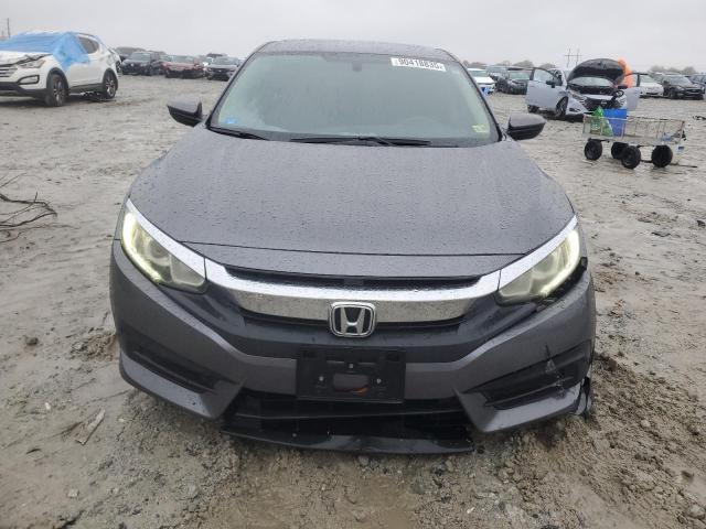 Photo 5 from auction – 2018 HONDA CIVIC LX with VIN 19XFC2F58JE202271