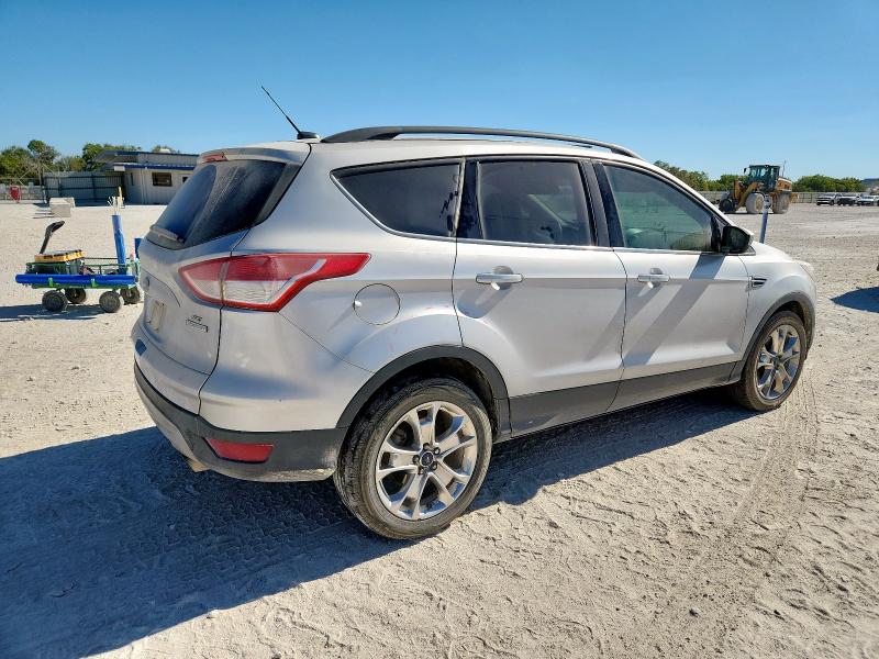 Photo 3 from auction – 2016 FORD ESCAPE SE with VIN 1FMCU0GX8GUA66007