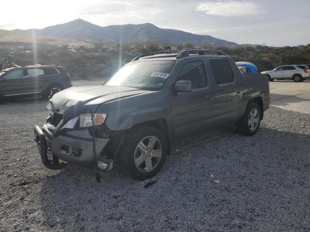 HONDA RIDGELINE 2011 with VIN 5FPYK1F56BB002322 - Photo from auction
