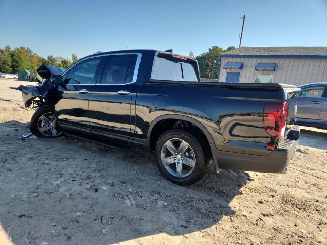 Photo 2 from auction – 2023 HONDA RIDGELINE with VIN 5FPYK3F74PB063172