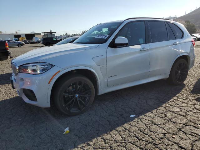 BMW X5 XDR40E 2018 with VIN 5UXKT0C52J0V98504 - Photo from auction
