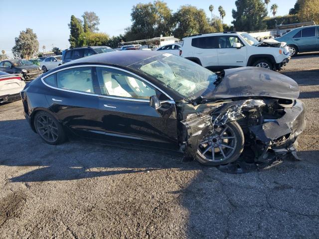 Photo 4 from auction – 2019 TESLA MODEL 3 with VIN 5YJ3E1EA1KF302097