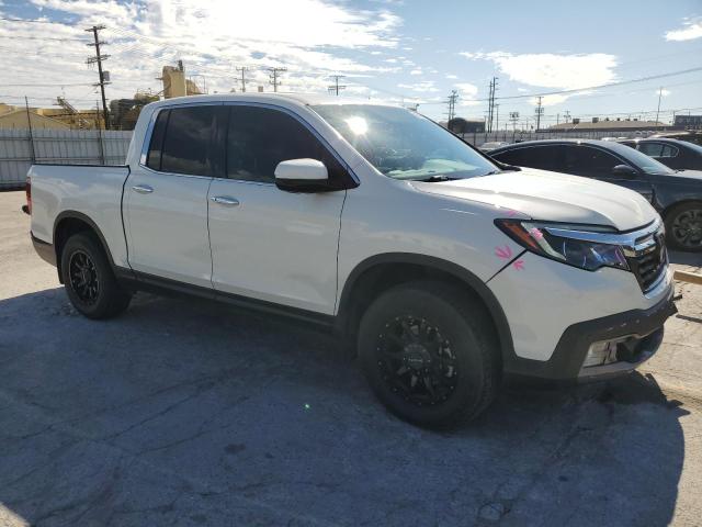 Photo 4 from auction – 2019 HONDA RIDGELINE with VIN 5FPYK3F76KB030165