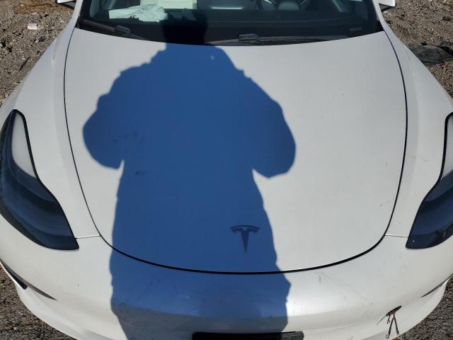 Photo 11 from auction – 2021 TESLA MODEL 3 with VIN 5YJ3E1EA4MF977980
