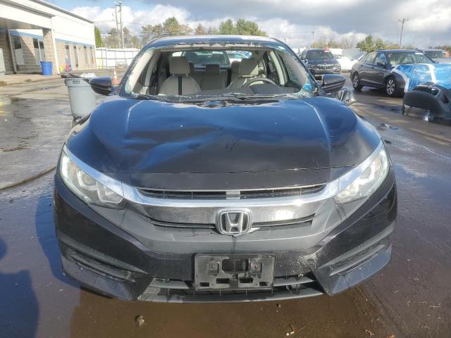 Photo 5 from auction – 2017 HONDA CIVIC LX with VIN 2HGFC2F50HH570184