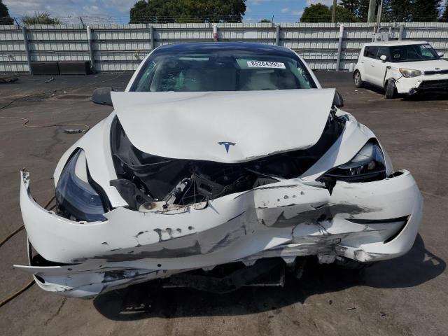 Photo 5 from auction – 2022 TESLA MODEL 3 with VIN 5YJ3E1EB0NF198165