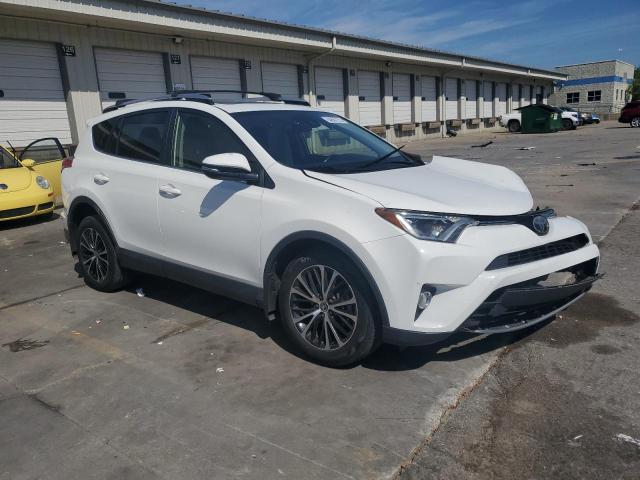 Photo 4 from auction – 2017 TOYOTA RAV4 XLE with VIN JTMRFREV5HJ706384