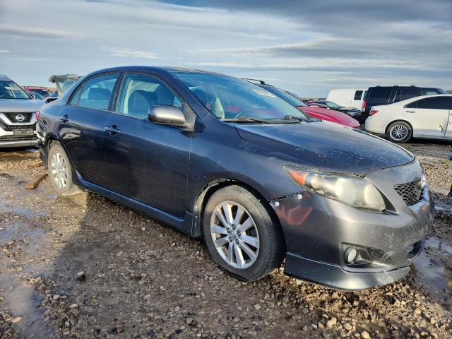 Photo 4 from auction – 2010 TOYT COROLLA BASE with VIN 1NXBU4EEXAZ330047