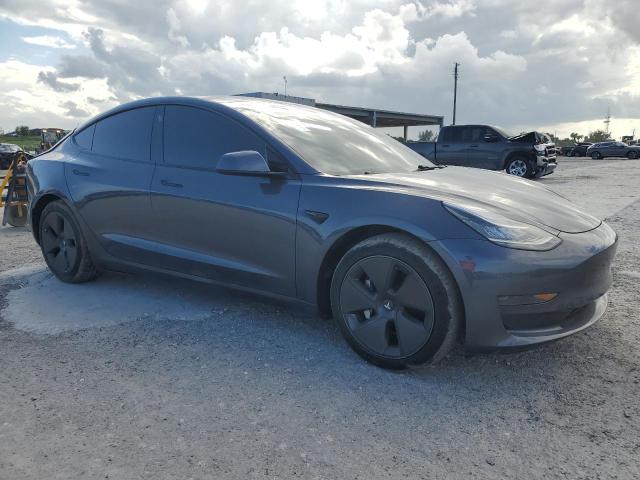 Photo 4 from auction – 2021 TESLA MODEL 3 with VIN 5YJ3E1EA6MF854083