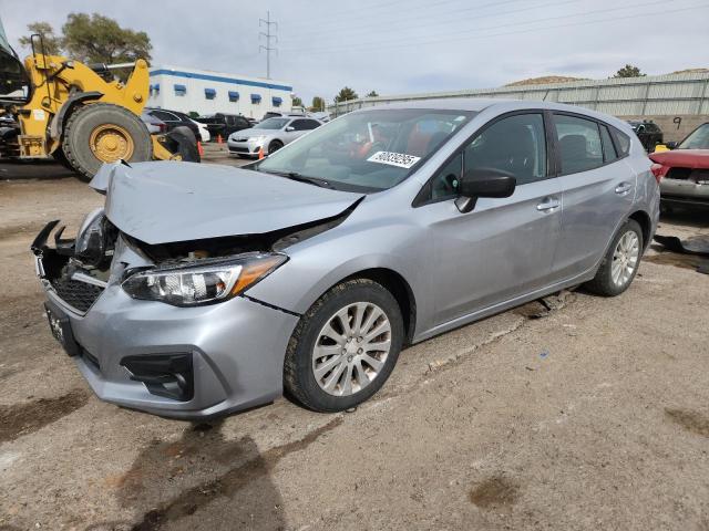 SUBARU IMPREZA 2018 with VIN 4S3GTAA66J3740277 - Photo from auction