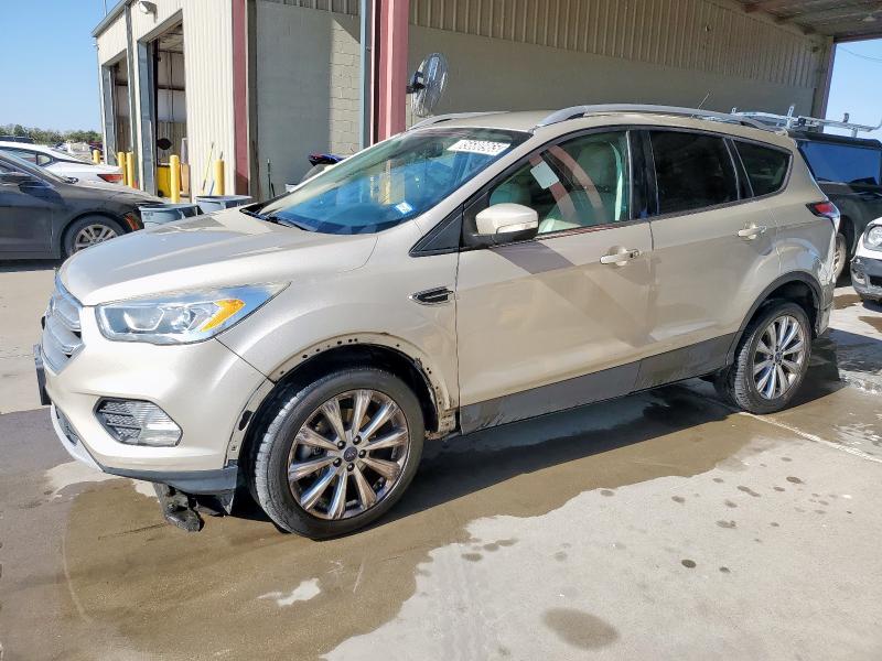 FORD ESCAPE TIT 2017 with VIN 1FMCU0J92HUD40622 - Photo from auction