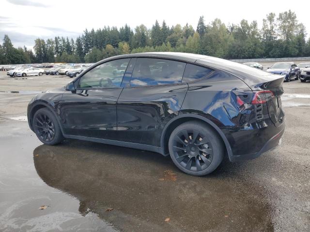 Photo 2 from auction – 2023 TESLA MODEL Y with VIN 7SAYGDEE3PF792640