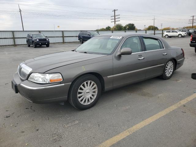 LINCOLN TOWN CAR E 2004 with VIN 1LNHM81W34Y610275 - Photo from auction