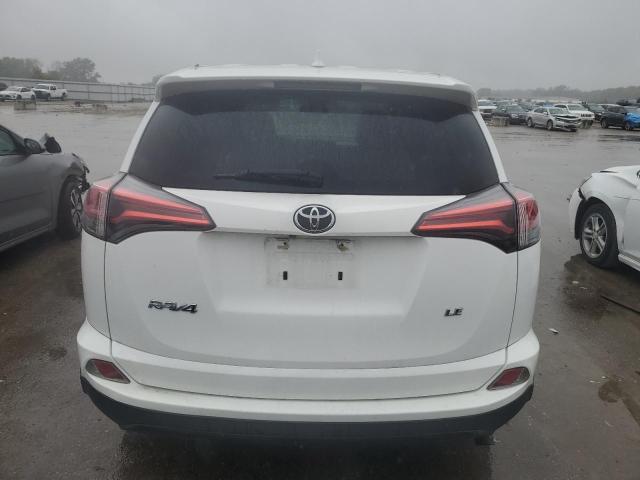 Photo 6 from auction – 2018 TOYOTA RAV4 LE with VIN 2T3ZFREV7JW432774