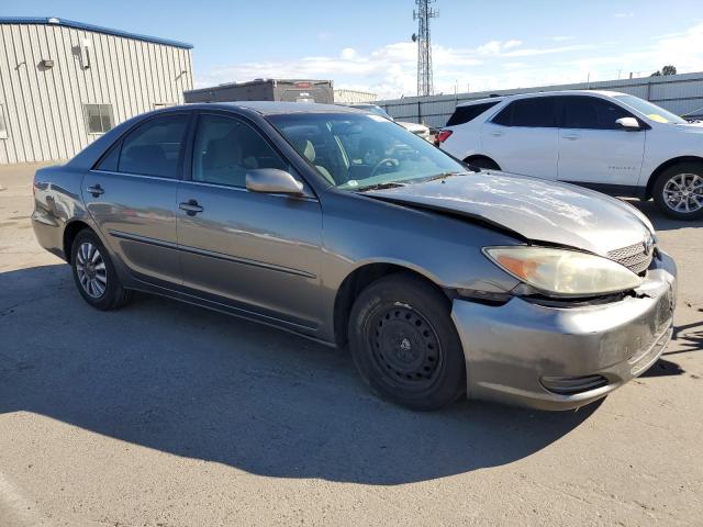 Photo 4 from auction – 2002 TOYOTA CAMRY LE with VIN JTDBE32K720064999