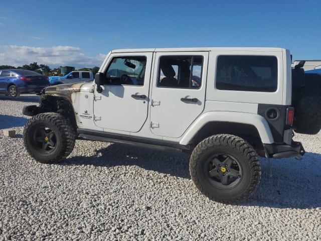 Photo 2 from auction – 2014 JEEP WRANGLER U with VIN 1C4BJWFG7EL230069