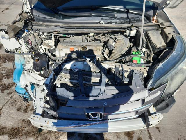 Photo 12 from auction – 2013 HONDA CRV with VIN 5J6RM3H79DL049677