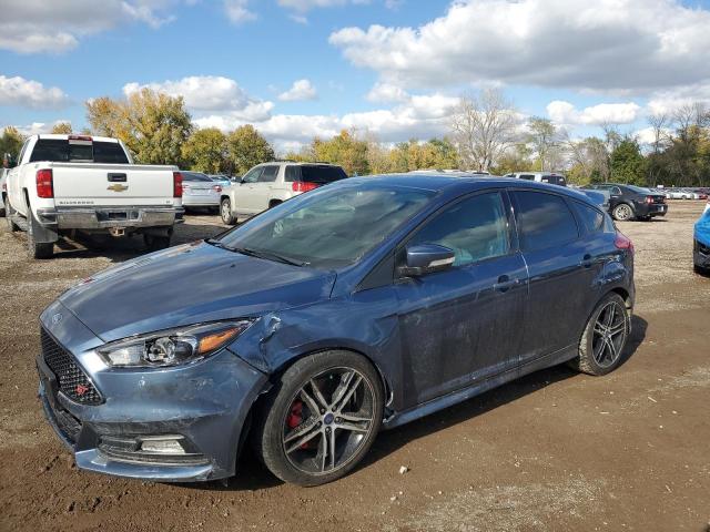 FORD FOCUS ST 2018 with VIN 1FADP3L92JL332584 - Photo from auction