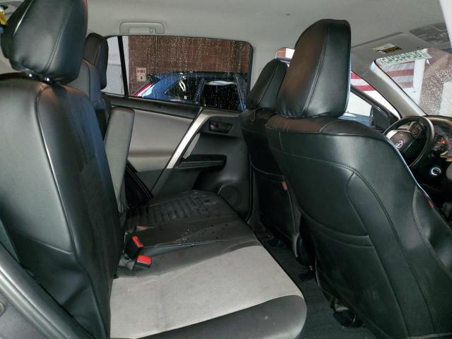 Photo 11 from auction – 2014 TOYOTA RAV4 LE with VIN JTMZFREV4EJ002852