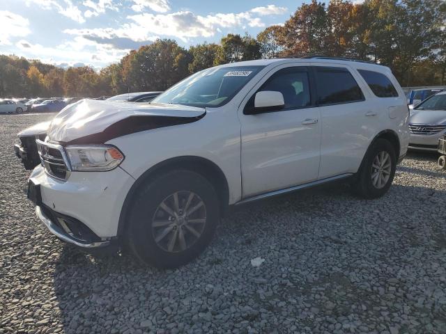 DODGE DURANGO SX 2014 with VIN 1C4RDJAG0EC971499 - Photo from auction