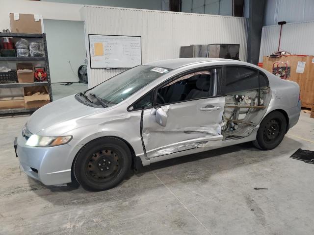 HONDA CIVIC LX 2011 with VIN 19XFA1F58BE046847 - Photo from auction