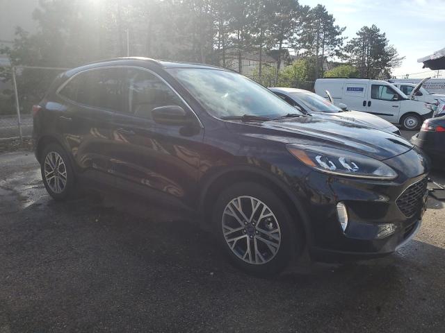 Photo 4 from auction – 2021 FORD ESCAPE SEL with VIN 1FMCU9H65MUA12573