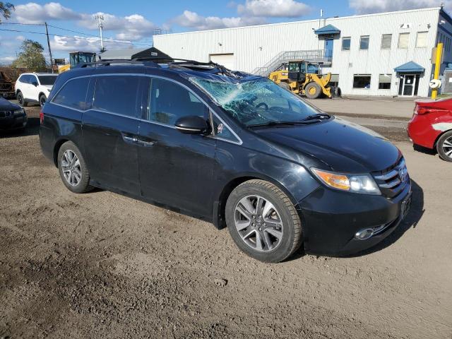 Photo 4 from auction – 2014 HONDA ODYSSEY TO with VIN 5FNRL5H92EB509367
